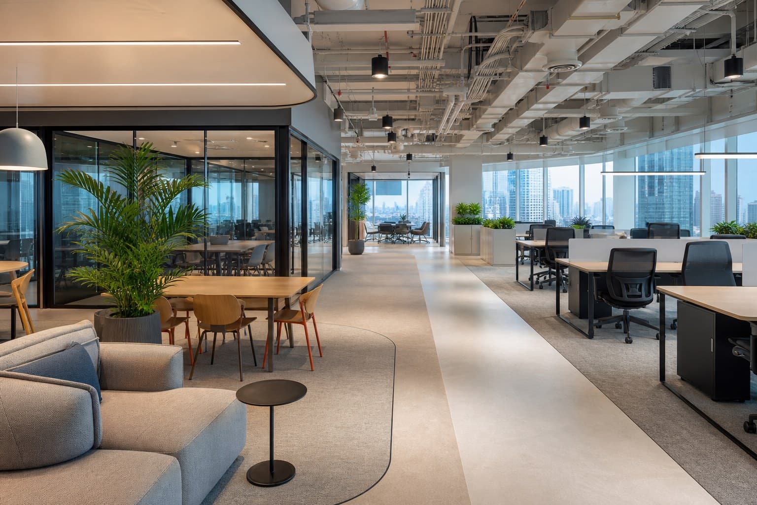 Activity-based Singapore office with open desks, glass focus rooms, and a collaboration lounge