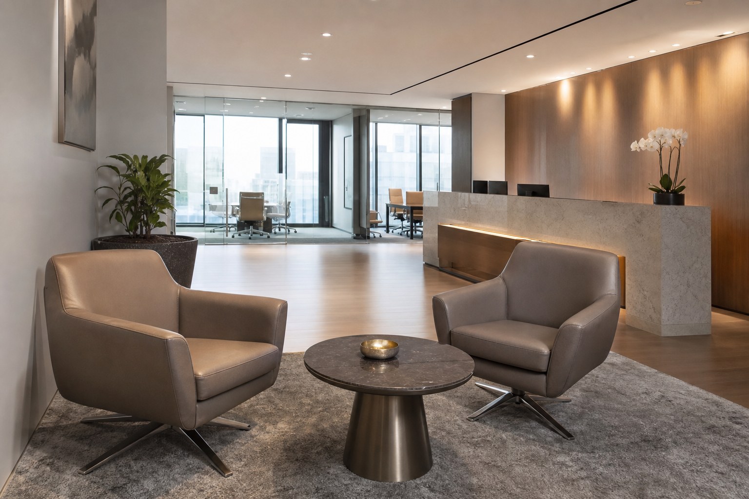 Visitor waiting seats facing a Singapore office reception and glass meeting room